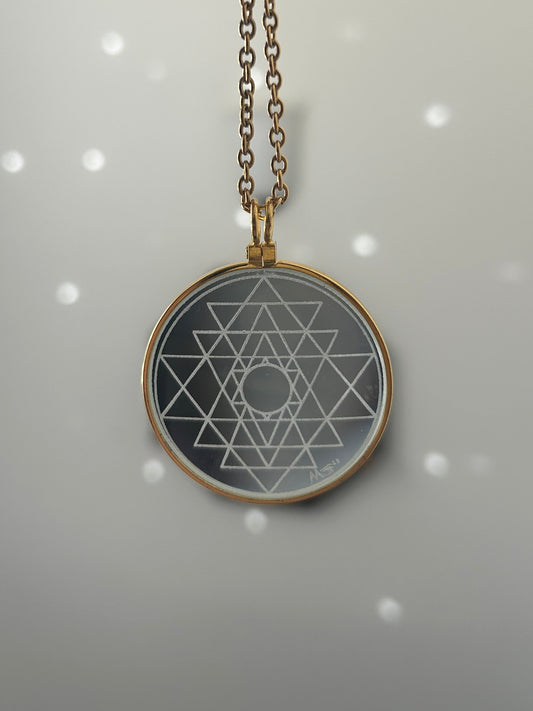 The Sri Yantra Solar Lighter Magnifying Glass Necklace